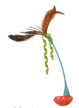 A feather and ribbon toy with two brown feathers and green curly ribbon on a blue plastic wand with a red base that has a curved bottom so it rolls back upright