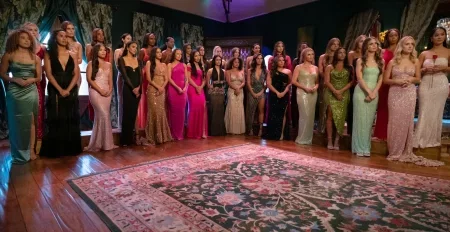 All of the women stand for the rose ceremony.