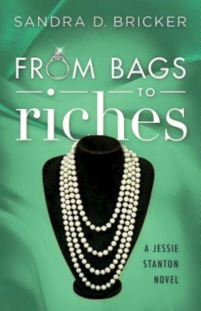 A set of four-strand pearls on a black necklace stand against a green fabric background with the title in white abve the necklace 
