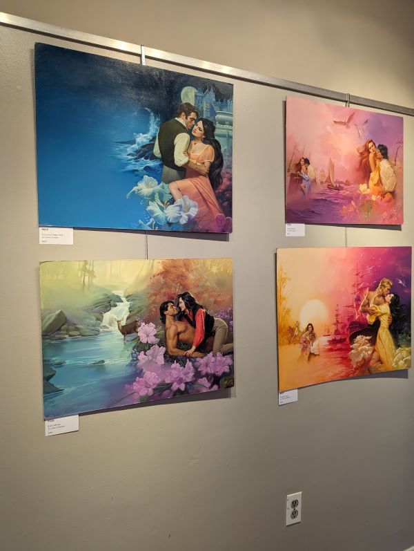 Another grouping of four, this time with two that are predominantly blue and alongside them are two that are more peach, fuchsia, and gold