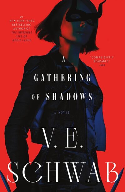 A gathering of shadows is a drawing of a woman with light skin and a dark bob wearing a black mask with horns and a black cloak against a red background 