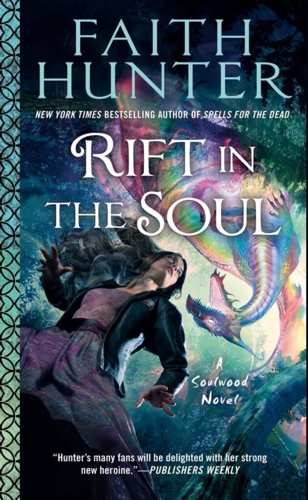 Rift in the Soul by Faith Hunter. A woman with dark hair is wearing purple patterned paints, a pink tank, and a black bomber jacket. She is looking up and our perspective is down by her knees, looking up with her. Above her is a green swirling sky and a roaring multi-colored dragon in various pastel shades of pink, blue, yellow, and purple.