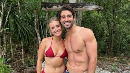 Daisy and Joey pose in their swimsuits
