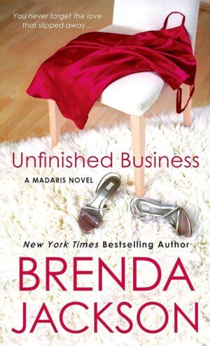 The new cover of Unfinished Business features a fluffy white rug, silver heels, and a slinky red dress thrown over a chair 