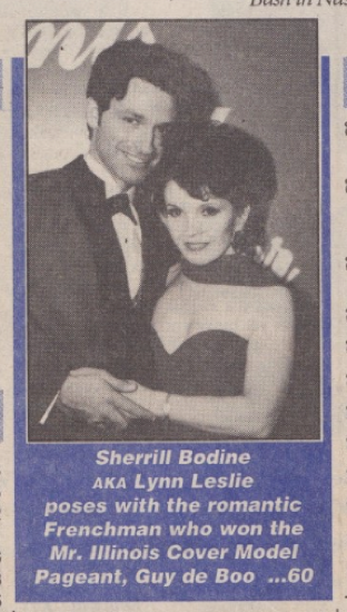 Author Sherrill Bodine AKA Lynn Leslie poses with the romantic Frenchman who won the Mr. Illinois Cover Model Pageant, Guy de Boo She is wearing a strapless dress with a scarf and he is in a tux