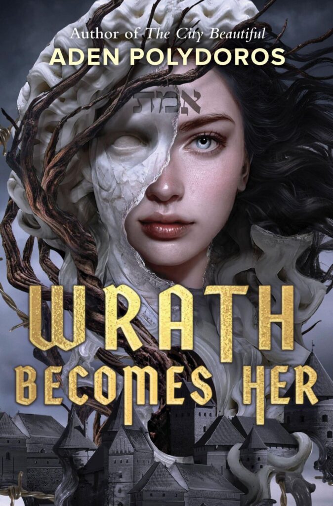 Wrath Becomes Her by Aden Polydoros. Most of the cover is a woman's face, half of which is turning into stone and branches are wrapping around her. The Hebrew word "emet" is written on her forehead. A dark gray townscape is along the bottom edge of the cover.
