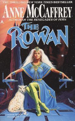 Anne McCafrey's The Rowan, which features a white haired woman with a gown and green tights, and a very big, very angry white cat next to her