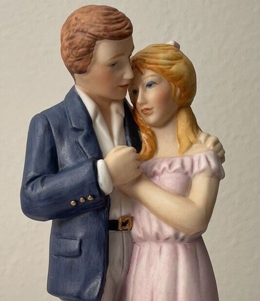 A close up of their faces. they look very young with big round faces and cheeks