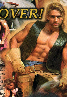 A shirtless man in a leather vest and long leather gloves, flexing his abs over low cut jeans and chaps. He has floppy blonde hair