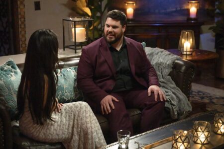 Brett sits next to Jenn