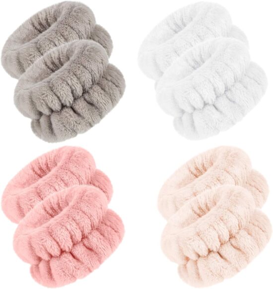 Four pairs of soft fuzzy scrunchies for your wrists to soak up water when washing your face 