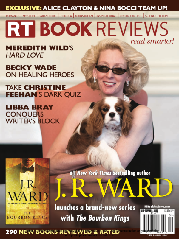RT Book Reviews from September 2015 JR Ward is on the cover and she's got blonde wavy hair in a hairsprayed style that I don't know the name of, with big diamond earrings and a triple strand of pearls. She's wearing sunglasses and a sleeveless black dress and is seated in a salmon colored chair. But the star of the cover is the Cavalier spaniel in her arms.