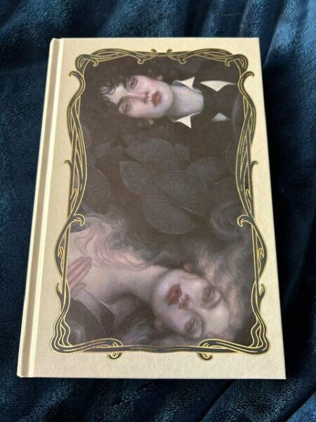 The original art for a Dark and Drowning Tide. The faces of a boy and a girl float in a dark body of water amid lily pads