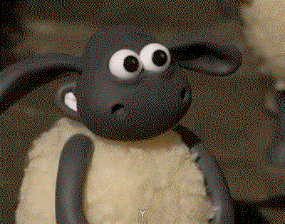 a claymation sheep gives a double thumbs up