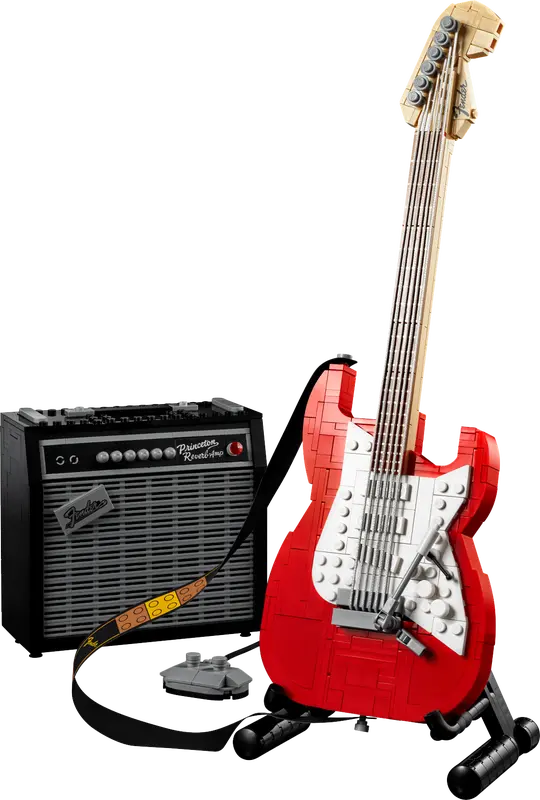 A lego set of a red Fender stratocaster guitar and a tiny amp 