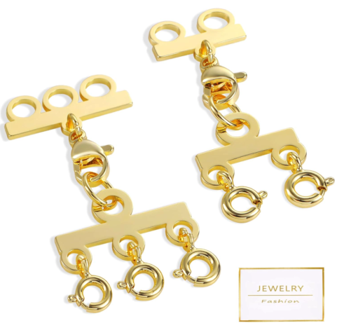 Layering clasps: one with three necklace catches, and one with two.