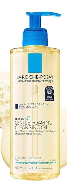 La Roche-Posay Gentle Foaming Cleansing Oil a yellow gold solution in a bottle with a blue pump top