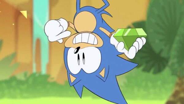 Sonic the Hedgehog, upside down holding a chaos emerald.