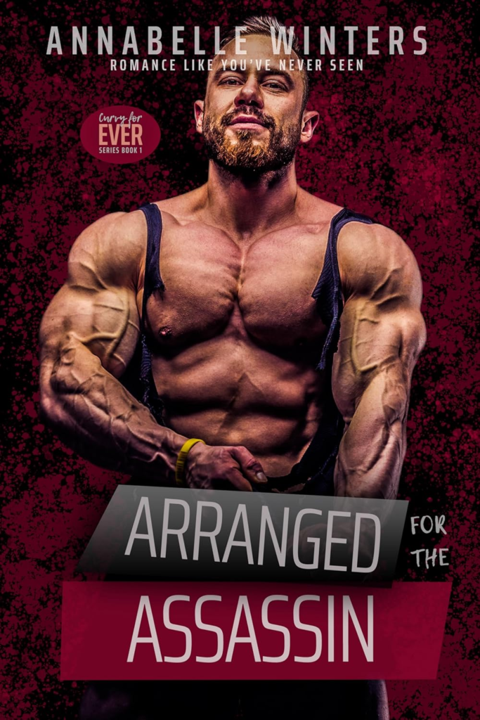 Arranged for the Assassin by Annabelle Winters. The background is a deep red, speckled with black. The cover is just a veiny, bearded, shirtless man who has clearly ripped his shirt to shreds due to his massive pecs and biceps.