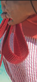 A Close up of a person's hand with the leash loops resting underneath it 