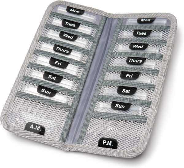 A grey folding pillcase with little pockets for morning and evening with tiny baggies inside