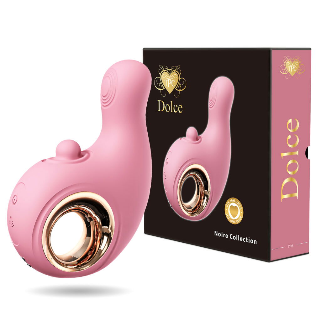 A pink vibrator, kind of shaped like a Q. The middle is hollow and rimmed in gold.