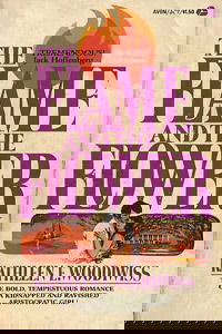 The original Flame and the Flower - mostly purple letters of the title with a flame at the top and an illustration of a dark haired white man and a white woman with long brown hair embracing 