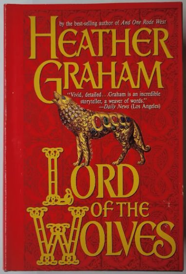 Lord of the Wolves in gold with the author name in gold against. red filigree background, with an image of a gold wolf statue with gems in its back