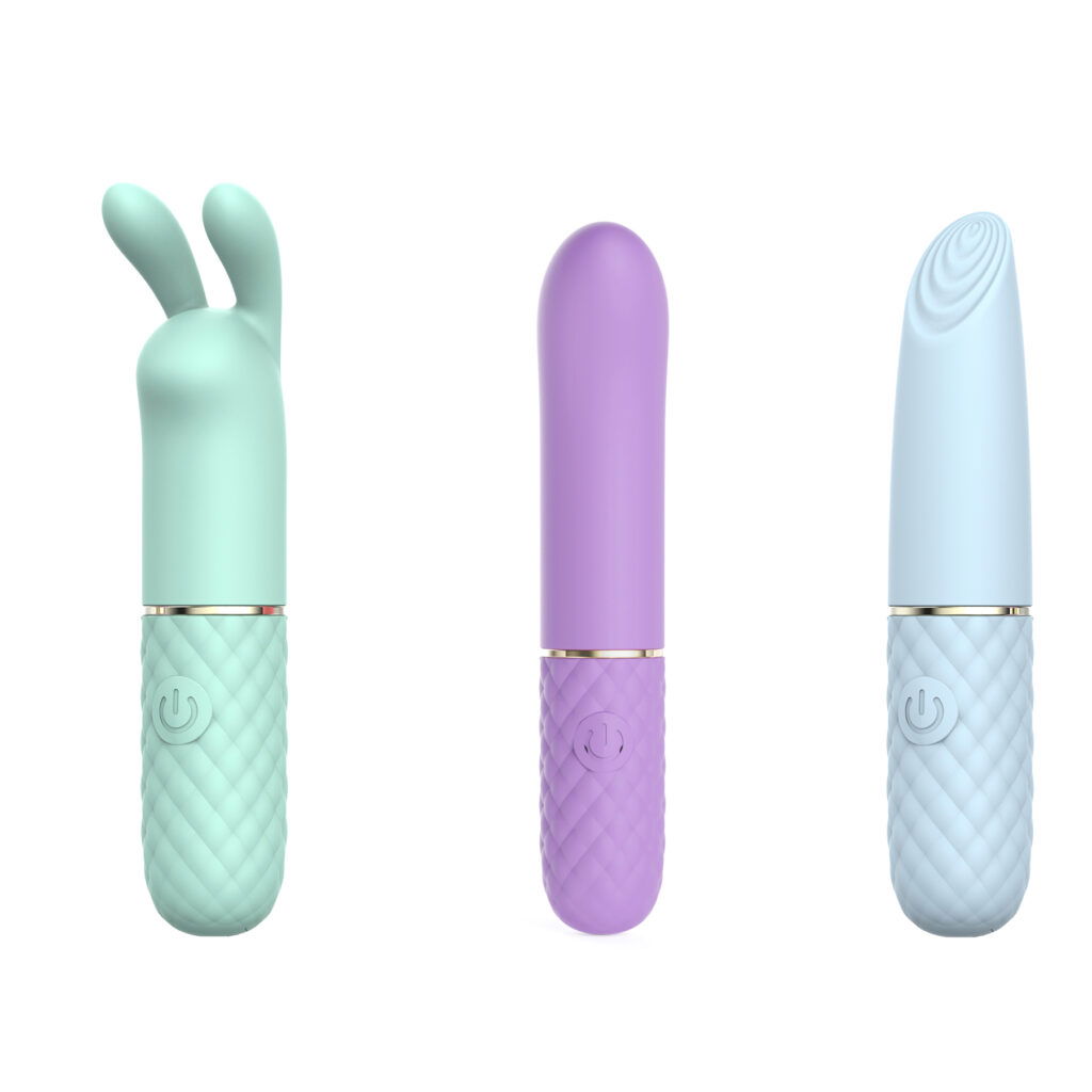 A trio of bullet vibrators in different pastel colors. There's a pastel green vibrator with rabbit ears, a pastel purple with a rounded tip, and a pastel blue with an angled and textured tip.