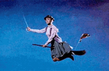 Eglantine Price from Bedknobs and Broomsticks riding a flying broom, wearing a WWII helmet, and holding a sword aloft as she flies off to fight Nazis