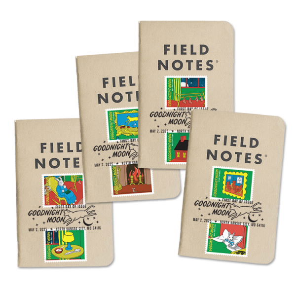 a set of four field notes notebooks with light brown covers. the stamps are fixed to the cover, two stamps randomly assigned, and cancelled with the first day of issue postmark, which features the cow jumping over the moon