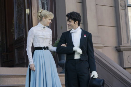 Marian holds Larry's arm