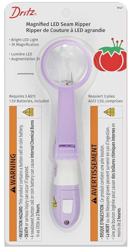 Dritz Magnified LED seam ripper - a purple seam ripper with a magnifying glass and a tiny LED light 