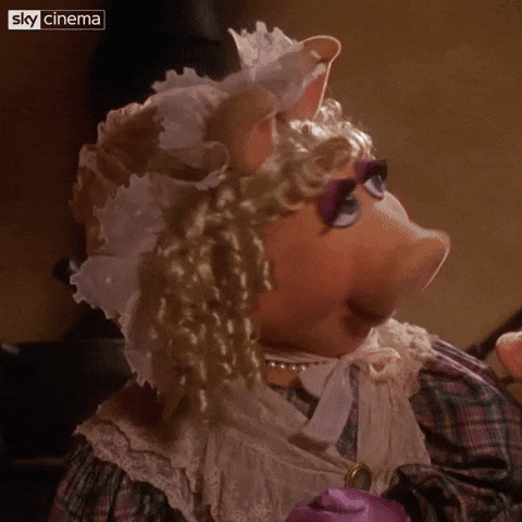 Miss Piggy dressed up for Muppet Christmas Carol says "Whatever"