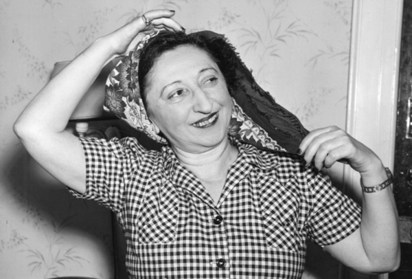 A black and white photo of a smiling Rosa