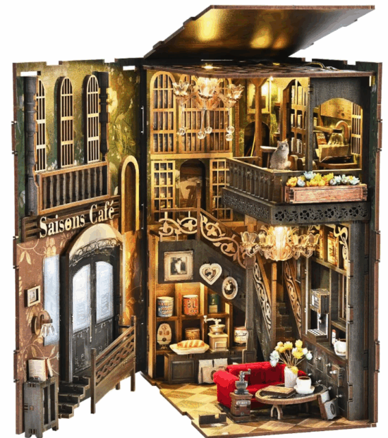 A cafe 3d puzzle kit with two levels, a fluffy sofa, and mostly grey and gold interior. 