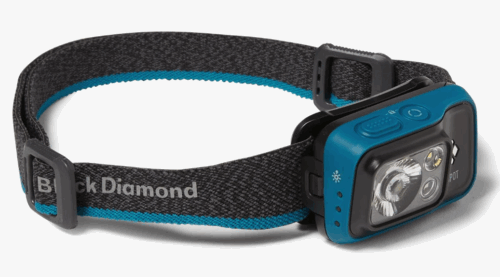 A grey and blue headlamp on an elastic band. The lamp is a rectangle surrounded by a blue plastic housing 