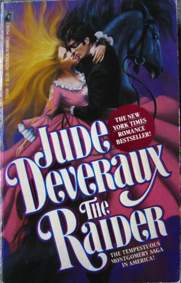 The raider by Jude Deveaux. The original cover! More than half of the illustration is her giant, swirling pink skirt. Her hair, which is blonde, is reaching out from her head in a giant fan, like an octopus almost, and the dude, and no idea HOW he is on this horse, is holding her around the waist. he's got a black suit and a mask over his eyes. The horse behind him has its mouth open and looks appalled.