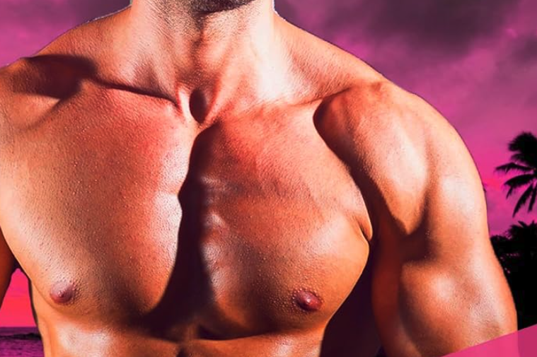 A close up of his sternum between his two pecs.