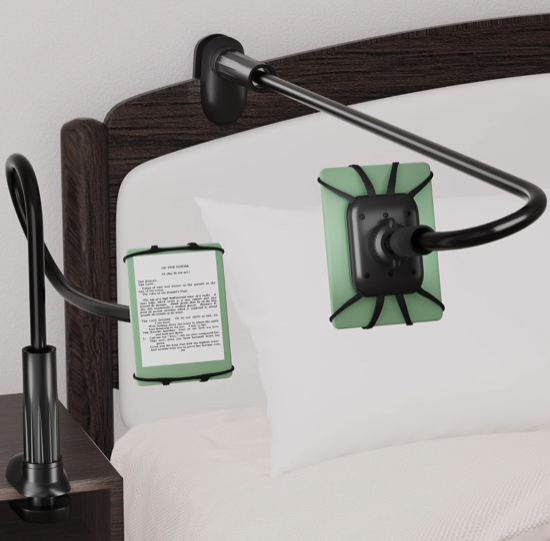 A gooseneck clamp e reader stand. one is attached to a side table and the other to a bed headboard 