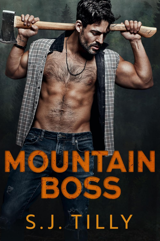 Mountain Boss by S.J. Tilly. A man in jeans and sleeveless open flannel. He's exposing his chest hair and has an axe behind his head. The axe position makes it look like one of those novelty headbands where there's an arrow going through your head.