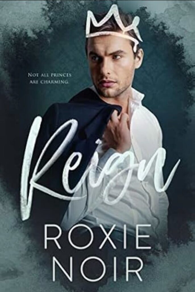 Reign by Roxie Noir. A photograph cover of a man in a white dress shirt with a suit jacket over his shoulder. He has a drawn on crown in white chalk on his head.