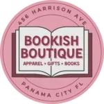 Bookish Boutique Logo: A pink circle with an open book in the center with text that reads BOOKISH BOUTIQUE apparel, gifts, books. Around the outside is the address