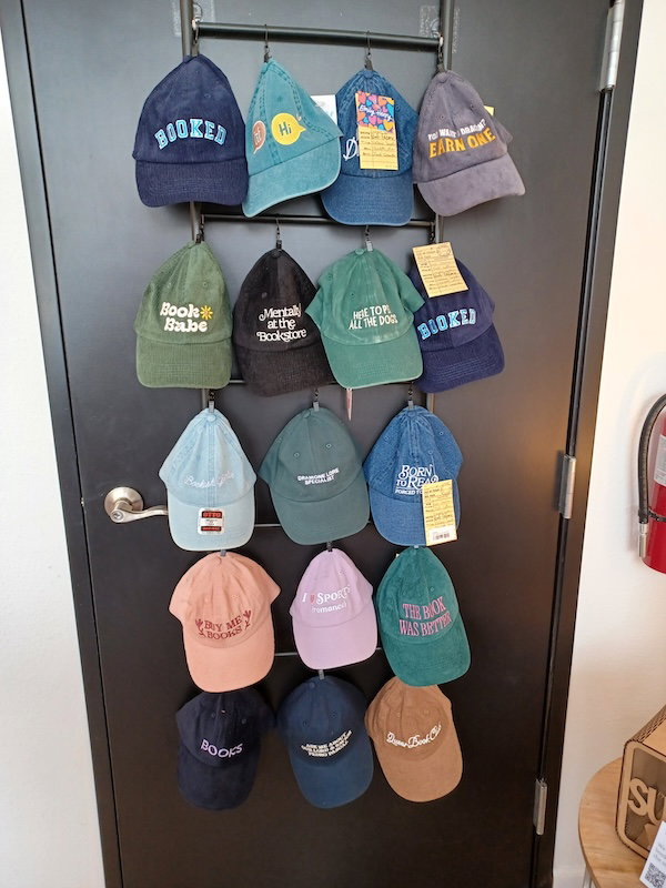 a display of hats at Finney's that say things like BOOKED, Book Babe, and mentally I'm at the bookstore
