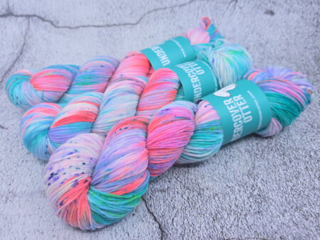 Really bright neon yarn with pinky-reds, aqua, lavender and purple specks