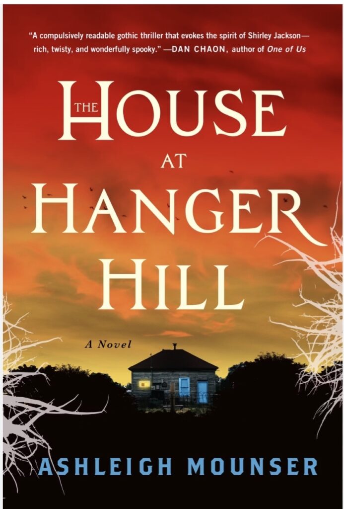 House at Hanger Hill by Ashleigh Mounser. The cover itself is fine, showing a spooky house during sunset, surrounded by dark trees.