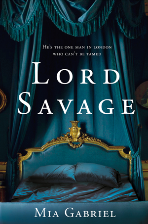 Deep blue bedhangings above an empty bed, with the words Lord Savage in white. No people.