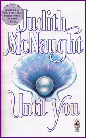 Until You older cover a pearl nestled in the base of a scallop shell with moisture glistening on the edges